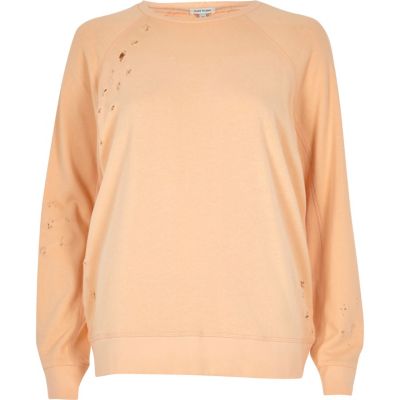 Light orange distressed sweatshirt